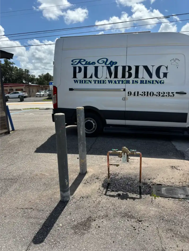 Rise Up Plumbing On The Job Van