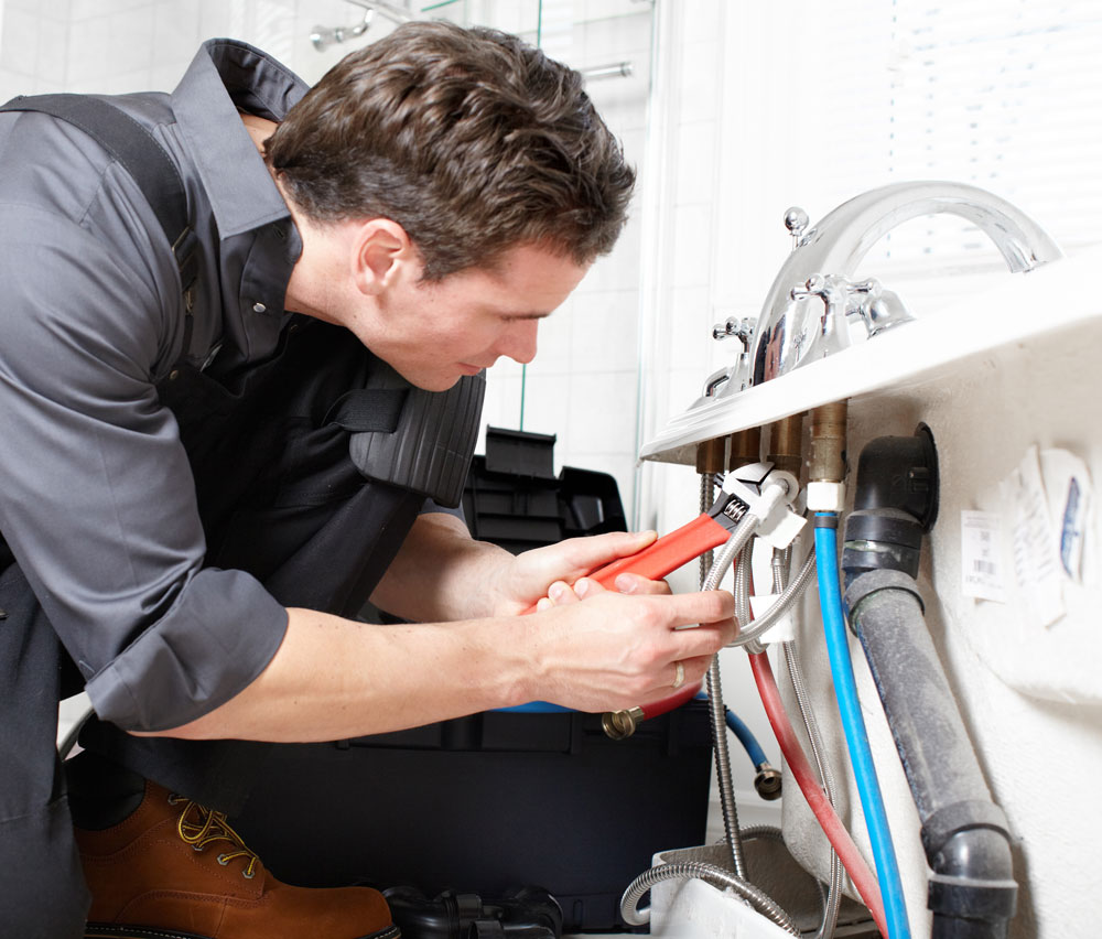 Plumber working on a pumbing issue